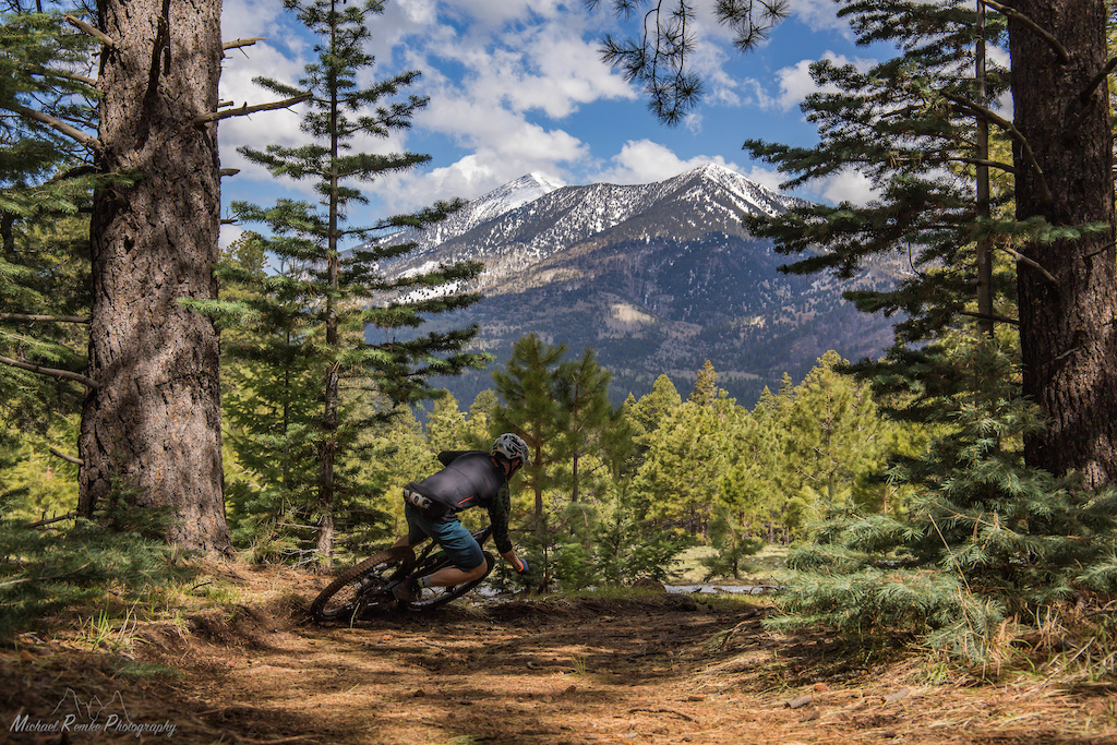 Zach loves to rip berms in the shadow of mountains