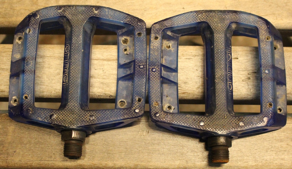$5 - Animal plastic pedals blue, small holes drilled in plastic. Work well.