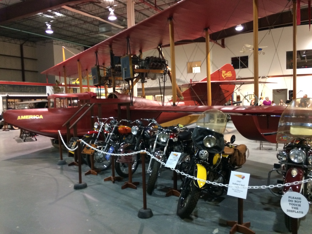 Curtiss plane with non curtiss bikes on display