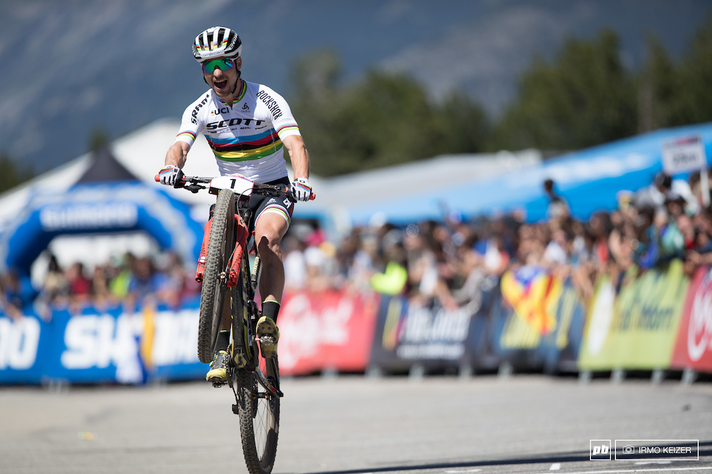 Schurter rode back to the line for a victory hop.