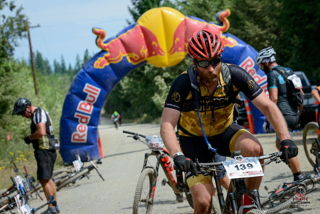 Canadian Sean Sealey of Batemans Bike Co. swings through aid station 2 of Day 1.