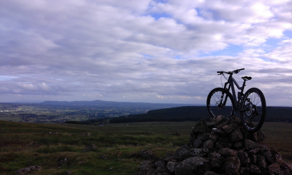 View from the top of Shanes Hill over looking Ballyboley forest. Cave hill (Belfast) in the distance. 
Bike - Vitus Escarpe 275