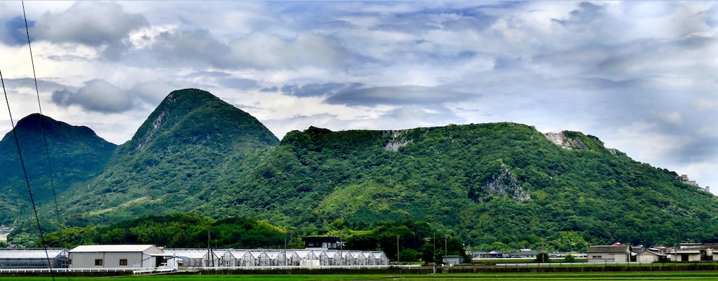 The most famous mountain in this city, its half gone as the inside has been used for concrete but looks cool in its decapitated state! From the peak to the left, you can see inside and the innards are hallow! Much deeper than you would expect looking from this angle!