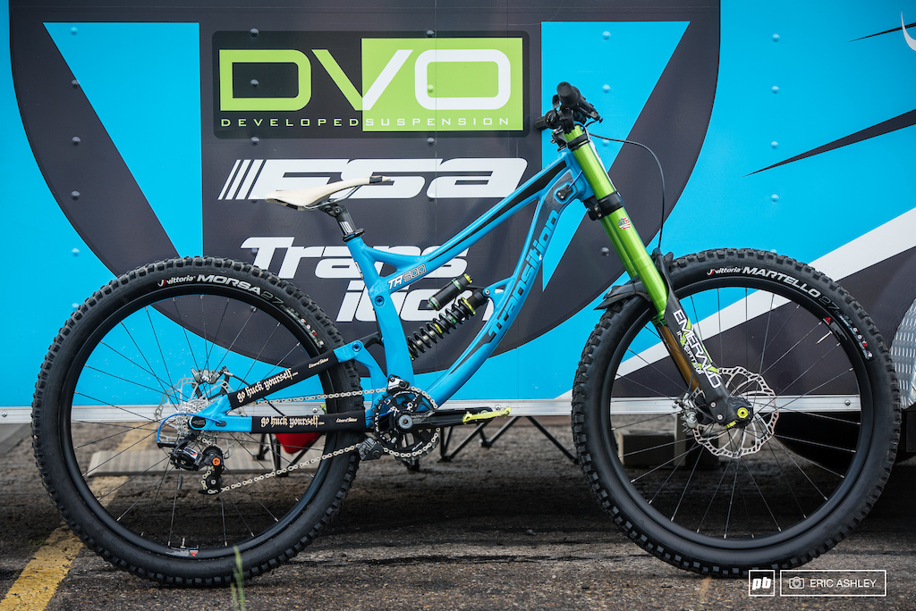 Between days is a great time to do a bike check. DFT United s Louie Blair has some nice touches on his small TR-500 this season. Custom DVO Emerald 180mm Fork Glory Wheels DH Carbon protoype wheels Magura MT 7 brakes Vittoria tires FSA Gradient prototype Billet 83mm DH crankset Box Custom Billet short cage protype derailleur and HT pedals.