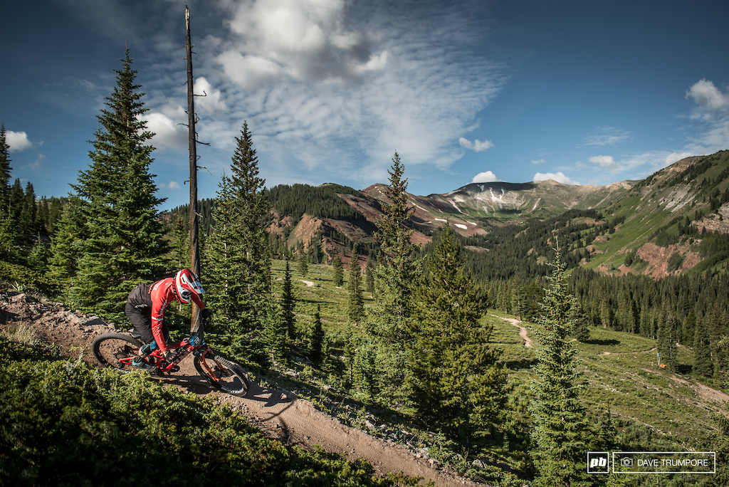 Lewis Buchanan hits one of the few bike park berms on stage 4.  After that things are fresh cut and rowdy.