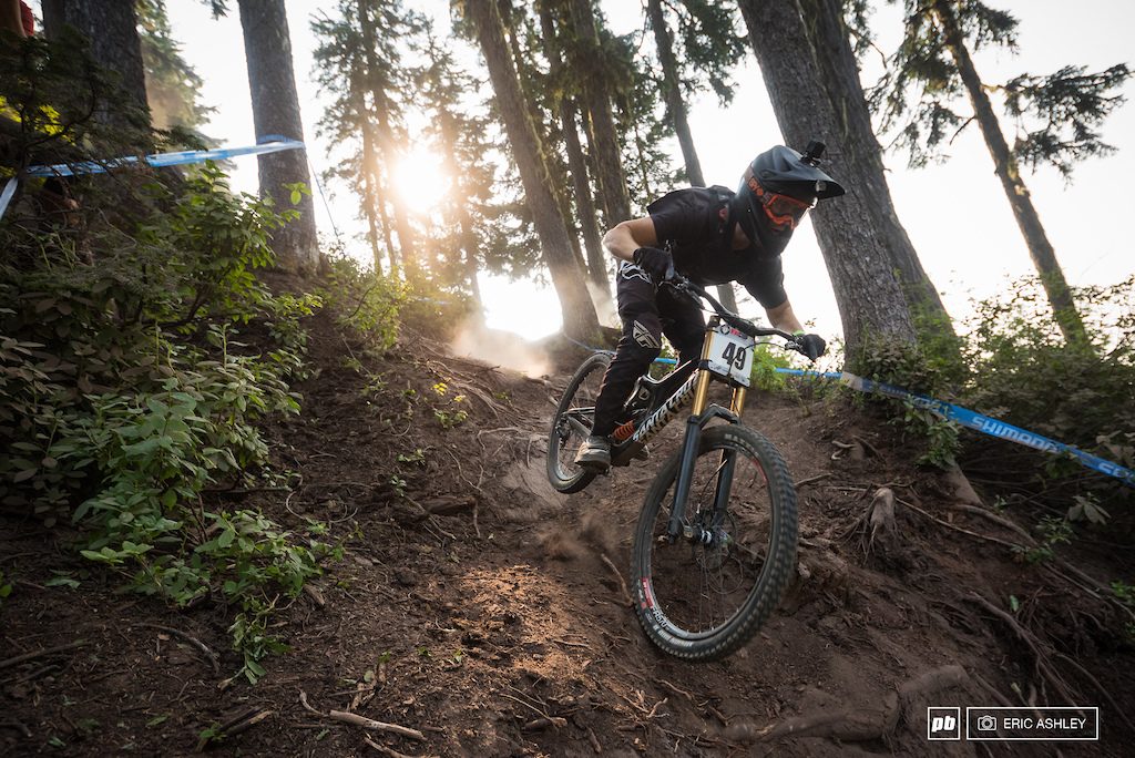 Kasper Dean charges down the waterfall to seed third Pro Men .