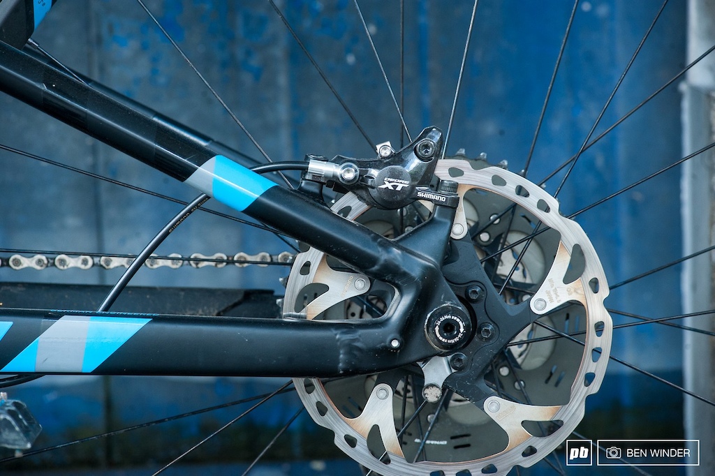 Shimano XT brakes with IceTec rotors. Also note the magnet for the speed sensor is bolted to the rotor mount, instead of being placed on the spokes.
