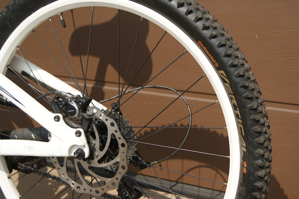 180 mm rotors with continental tire on rim