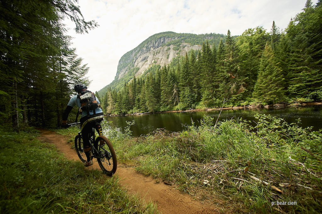 "Taking a moment to enjoy the view."  

Quebec Singletrack Experience. Day 5 at VallÃ©e Bras du Nord - Shannahan.
46.1 km (28.6 miles)
photo by Bear Cieri