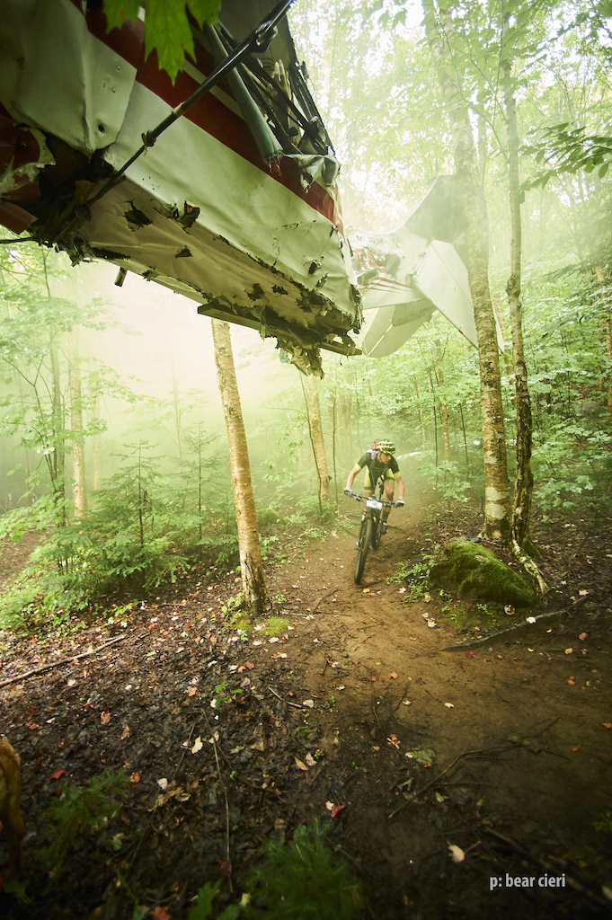 "An old plane wreck lingering above the singletrack on the last stage."

Quebec Singletrack Experience. Day 7 at Lac Delange 
18.7 km (11.6miles)
photo by Bear Cieri