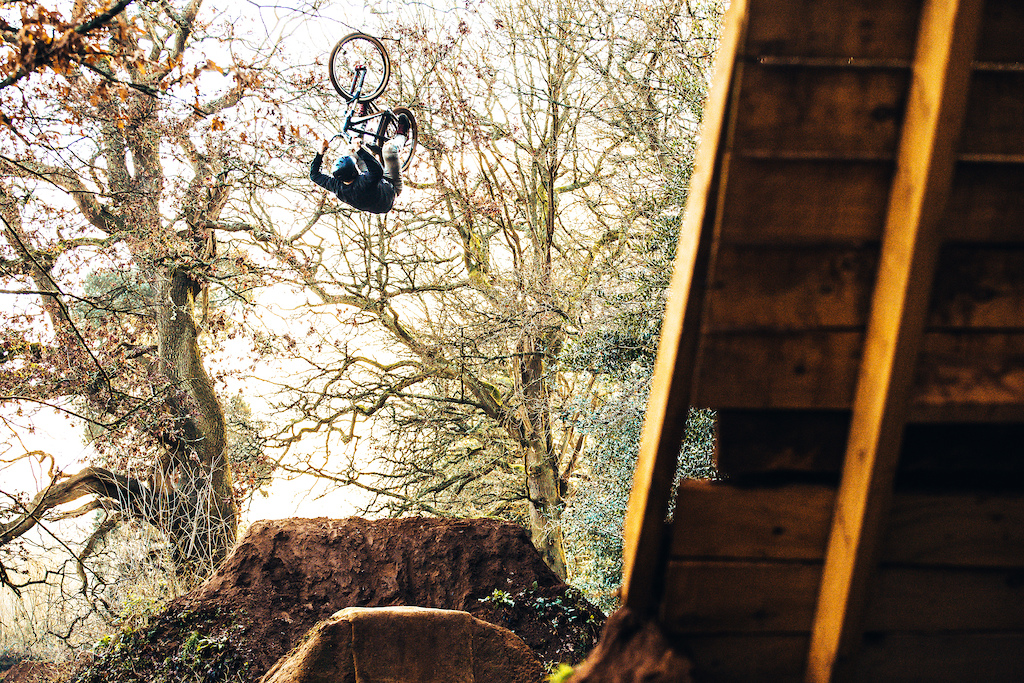 Danny Pace going pure darkness with a huge boosted backflip at S4P Bikepark