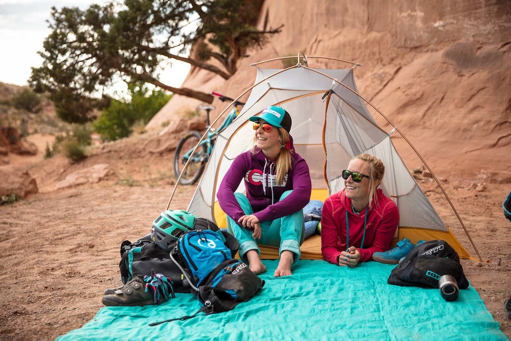 Photo Permission Courtesy of Yeti Cycles - Yeti riders Sarah Rawley and Liz Cunningham chill after a day of riding.