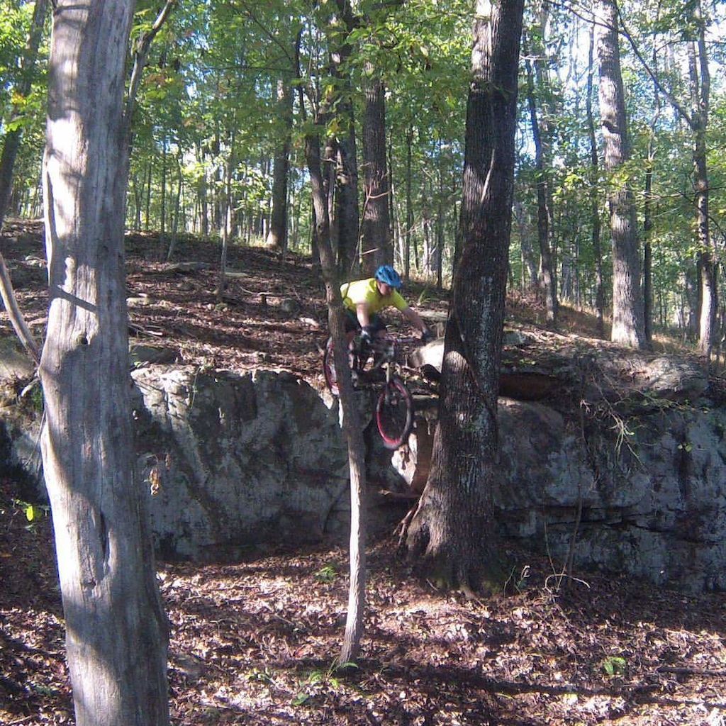 Main huck on fall line trail, about half way down. 8 ft to the lander. Circa 2015