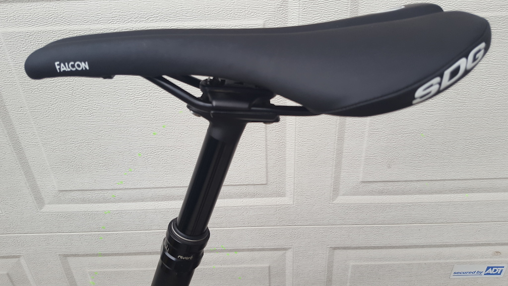 125mm Reverb dropper with brand new SDG Falcon saddle.