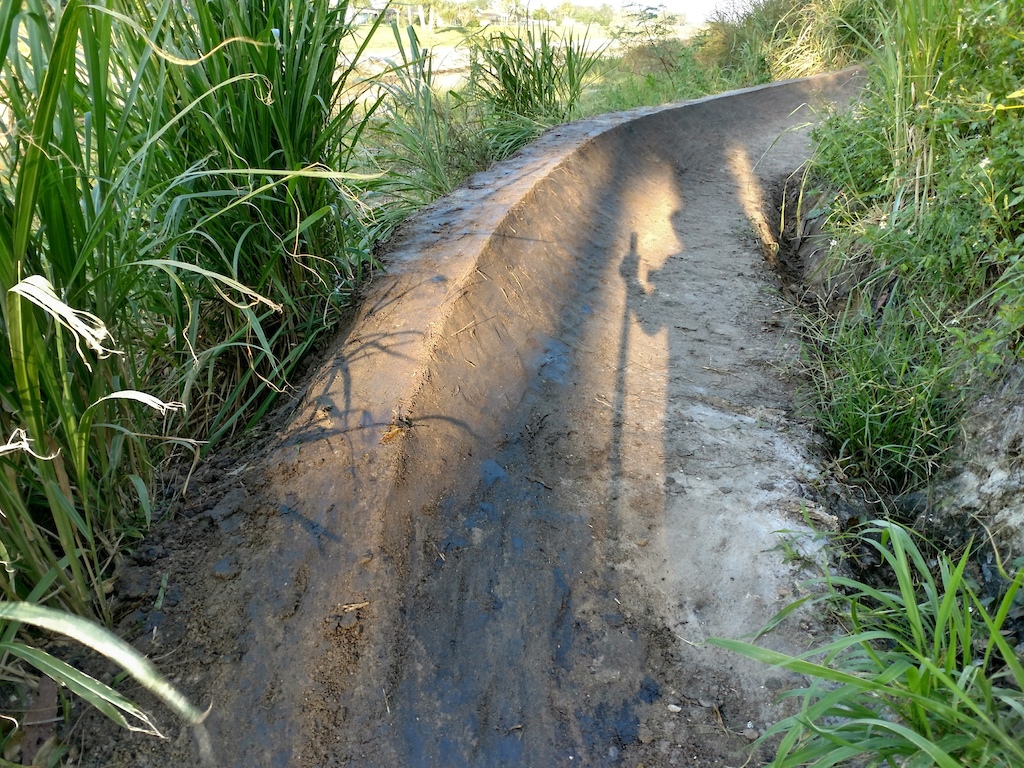 This is the berm on the "shore-line" trail directly after the drop, following the six-pack jump line. After hurricane Irma, I reshaped it, adding more height. We're hoping for an early fall this season. I'm working to get all lines dialed in for an awesome Florida fall/winter riding season
http://ridebmba.org/