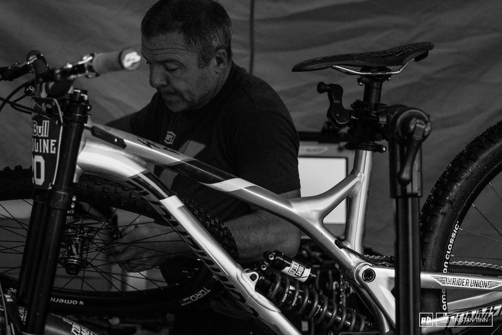 Dave Garland Yoanns mechanic hard at work to get the bike in order