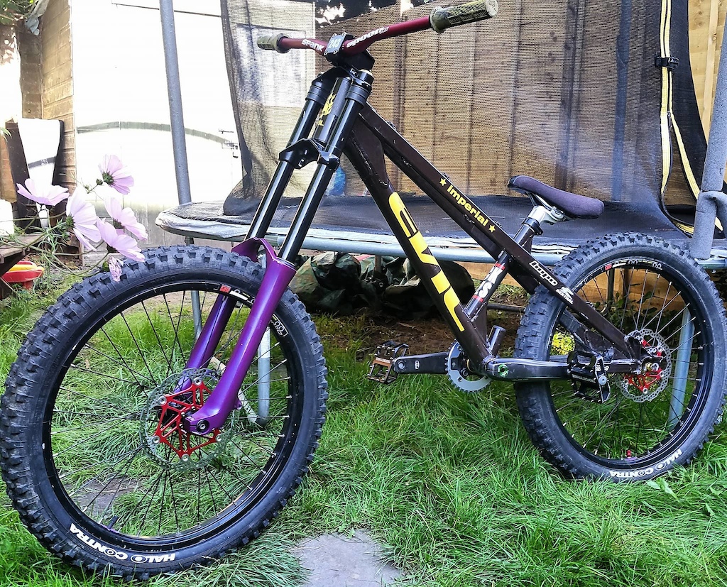 My Evil Imperial, with purple 888's just for the picture (got some perfect condition 2005 888R  to on) This is just to see what it would look like hence having no brakes or chain lol. but i have just bought shimano Zee gears to go on. Gonna be riding lots of downhill on it :D