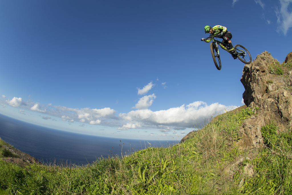 On the edge. MADproductions superstar, Emanuel Pombo, riding in Ponta do Pargo, Visit Madeira.