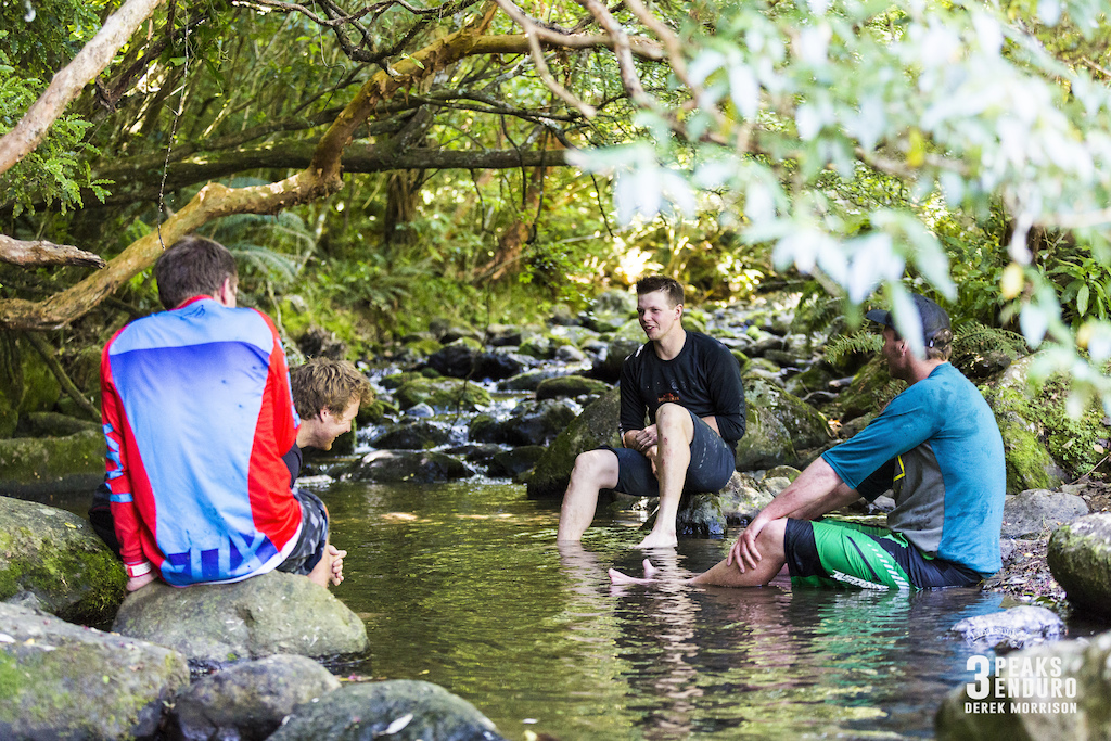 Cooling off in the waterway at Bethunes Gully during Day 1 of racing in the sixth edition of the Emerson's 3 Peaks Enduro mountain bike race held in the hills above Dunedin, New Zealand, at the weekend (December 02-03, 2017).