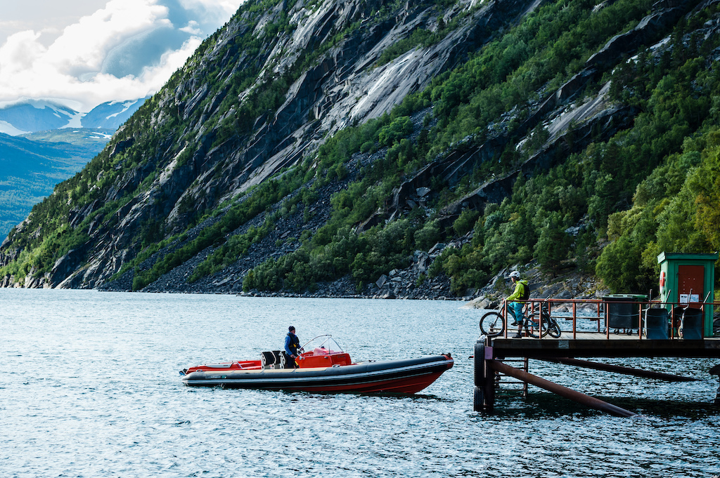 Boat arrives to pick up Joey Schulser and Mikael af Ekenstam in Rombaksfjorden, Norway.