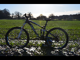 Trek Fuel EX 5 on a field with the perfect backdrop