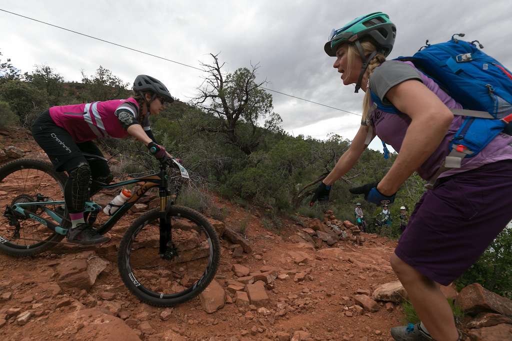 Lindsey helps a student around a technical corner in Sedona, AZ