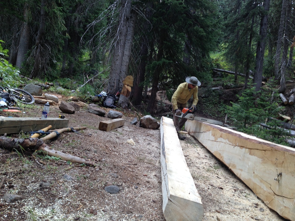 The trail boss doin a lil touch up on a log bridge on the 1st upper section of Flash of Gold