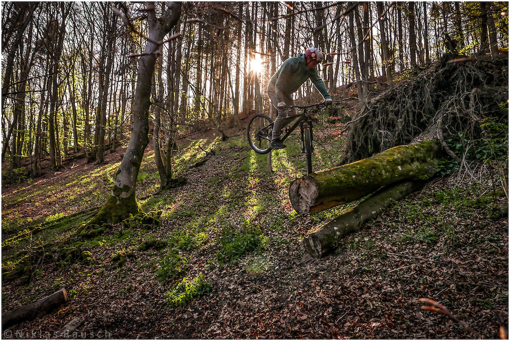 rolling down that tree to 360, starting this way. Great rider to work with and to look at, even on trialsbike or bmx. In this case he's using his 26" Transalp to play with.