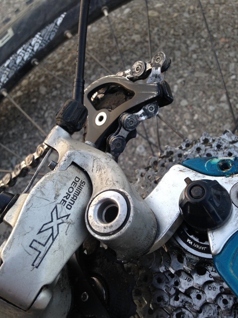 Have you ever seen an XTR chain twisted 90 degrees? That's some serious leg power... 27th gear on a 35 degree incline hill.
