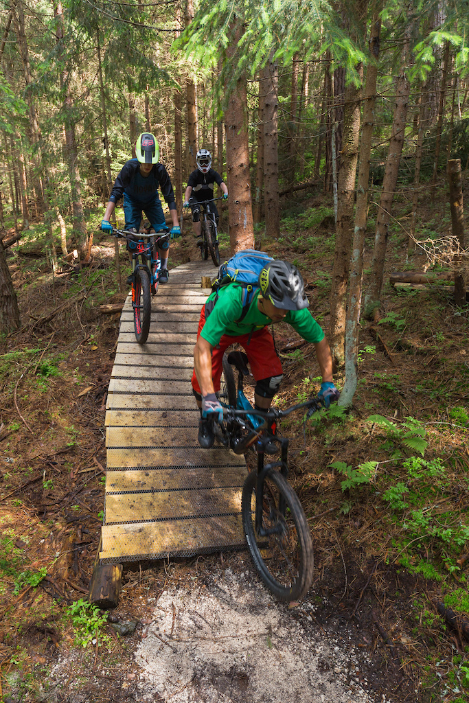 This a photo from one of the wooden features in our tiny local trail park named Zichna trail from alpine villag Crna na Koroskem. Some small drops, doubles, berms and wooden bridges were built in 2018, trails is fun and finishes almost in towns center. Photo: Alen Odzakovic