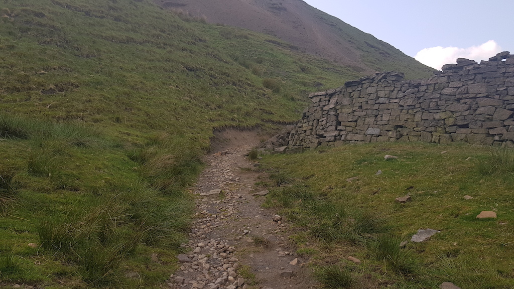 Berm round a wall. Gonna try not to clip my already crappy brain off anything on the inside there.