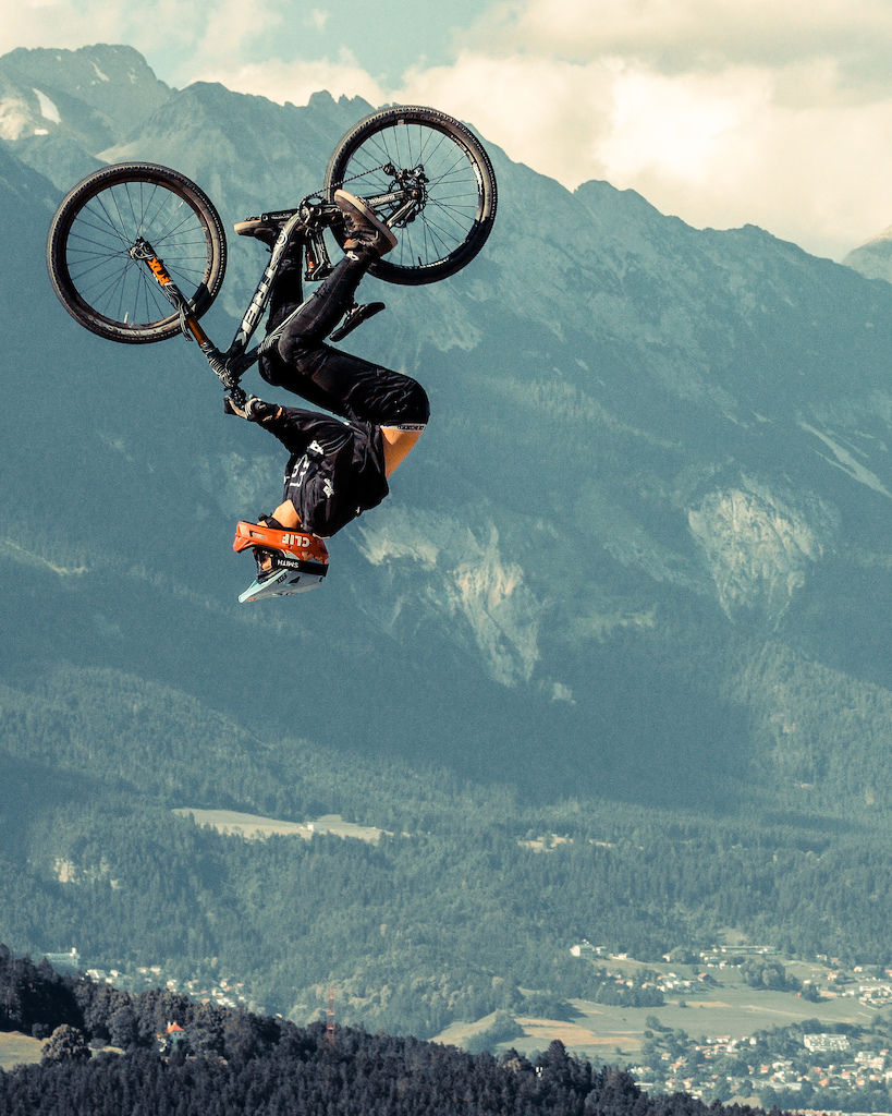 Rider Brett Rheeder upside down at the Crankworx Slopestyle Finals in Innsbruck.
