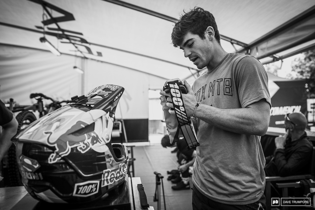 With hot temps and sunny skies to kick off the day, I the idea of tear offs could not have been further from Loic Bruni's mind as he prepped goggles before the morning practice session.