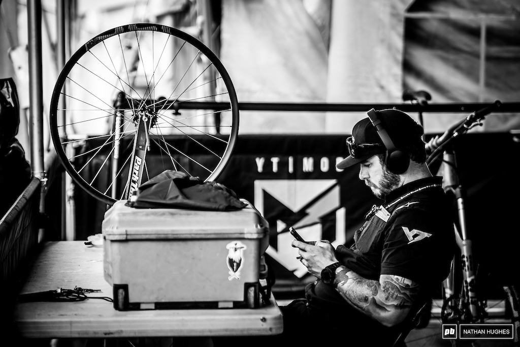 Black and white is the only option for a sad scene like this... Aaron Gwin's mechanic, John Hall, with nothing but time on his hands. Hopefully we'll be seeing AG back for France.