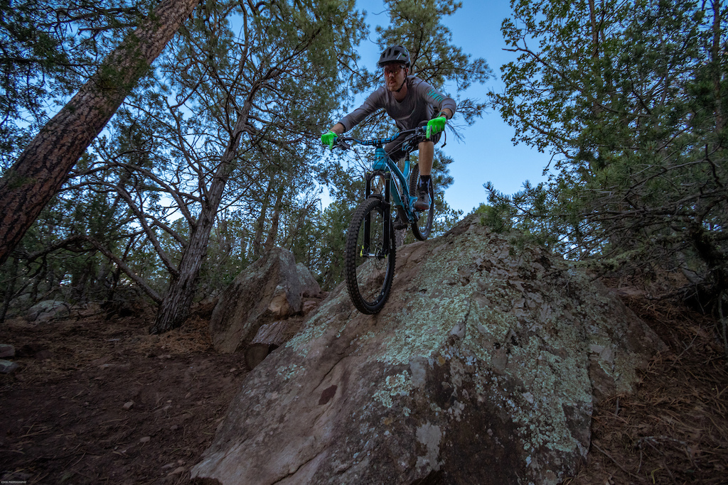 Ian Eagle hitting one of many rock rollers on the Three Bottles trail in Tijeras, NM.