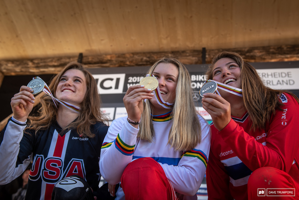 Valle Holl, Anna Newkirk, and Mille Johnset celebrate gold, silver, and bronze in Junior women.