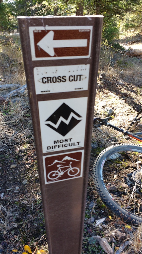 Trail marker sign at the intersection of Notch &amp; Cross Cut. TF shows trail marked as Carlito's Way.