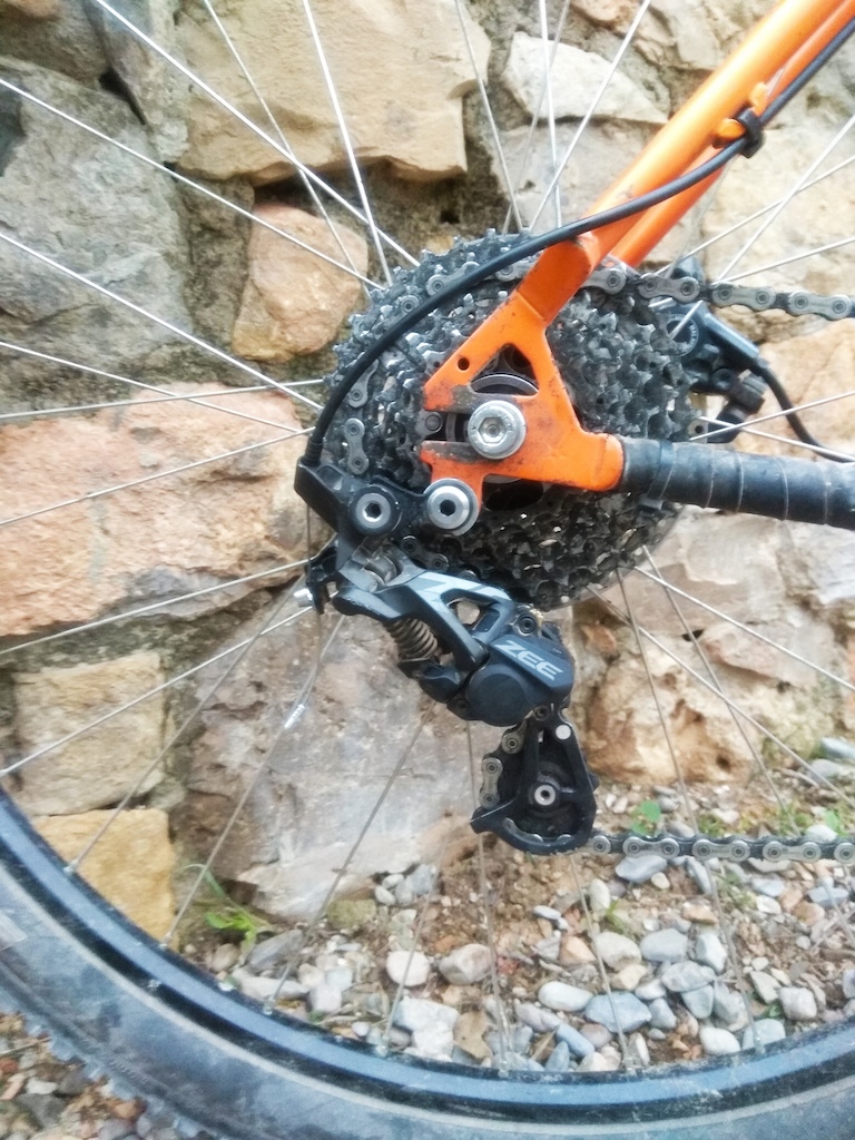 Converted my singlespeed to 1x6.
Zee derailleur (FR) 
XT thumbshifter
Hop Pro2 singlespeed hub
2 spiders (6 lacest cogs) from a used XT 11-36 cassette.