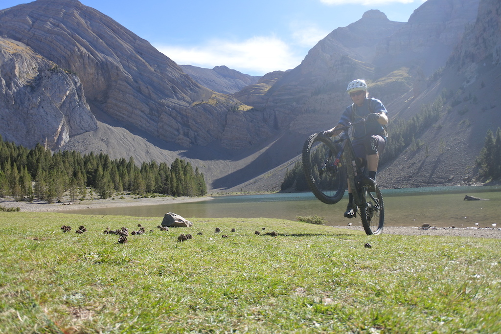 Never to old to play and do wheelies.

A14 km climb brought buddy Mark and me to Ibon the Plan. A mountain lake at about 1900 meters altitude. What followed was a 7 km long flowy single track down through the alpine forest to Saravillo