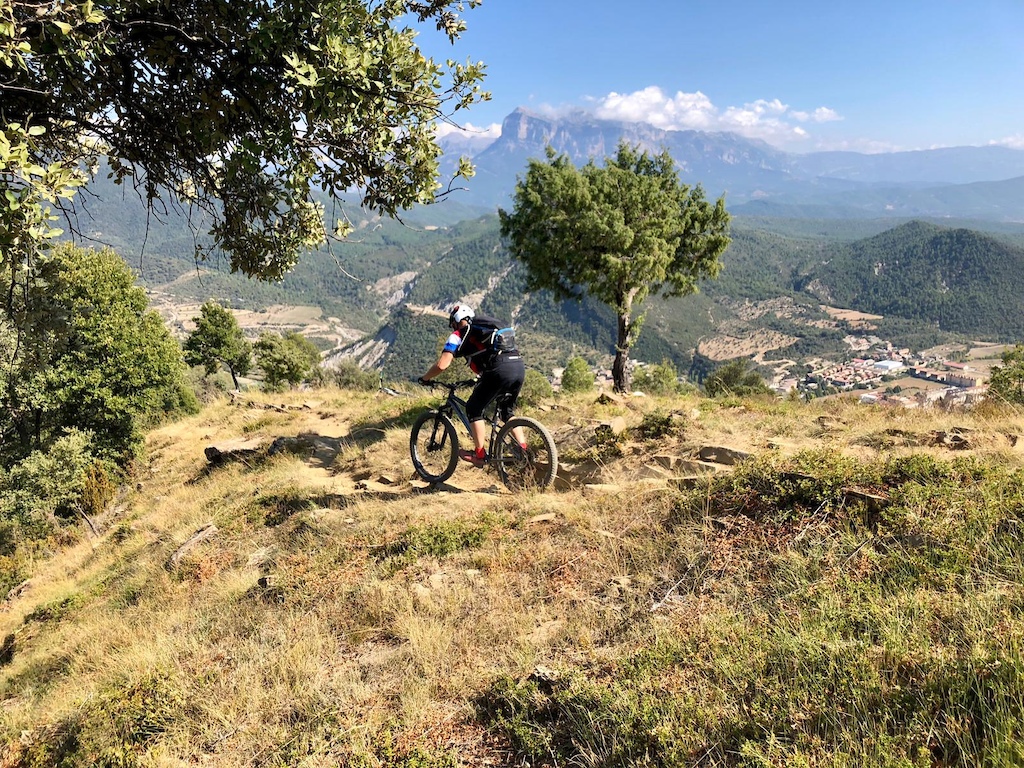 Me riding down the La Coasta trail above Boltaña. It was the 5th stage of the EWS 2018. I love the views on top of this trail