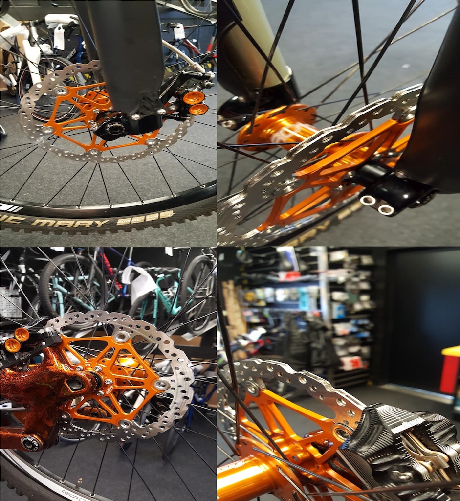 Hope Vented rotors for my Demo S-Works with orange spiders to match my hubs