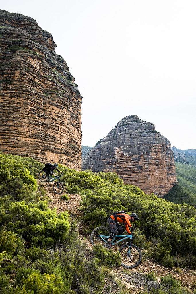Rafa and Daniel roll the fast and loose Salto del Roldan trail, named after a legend about a horseman leaping between the rock towers in a single bound.
