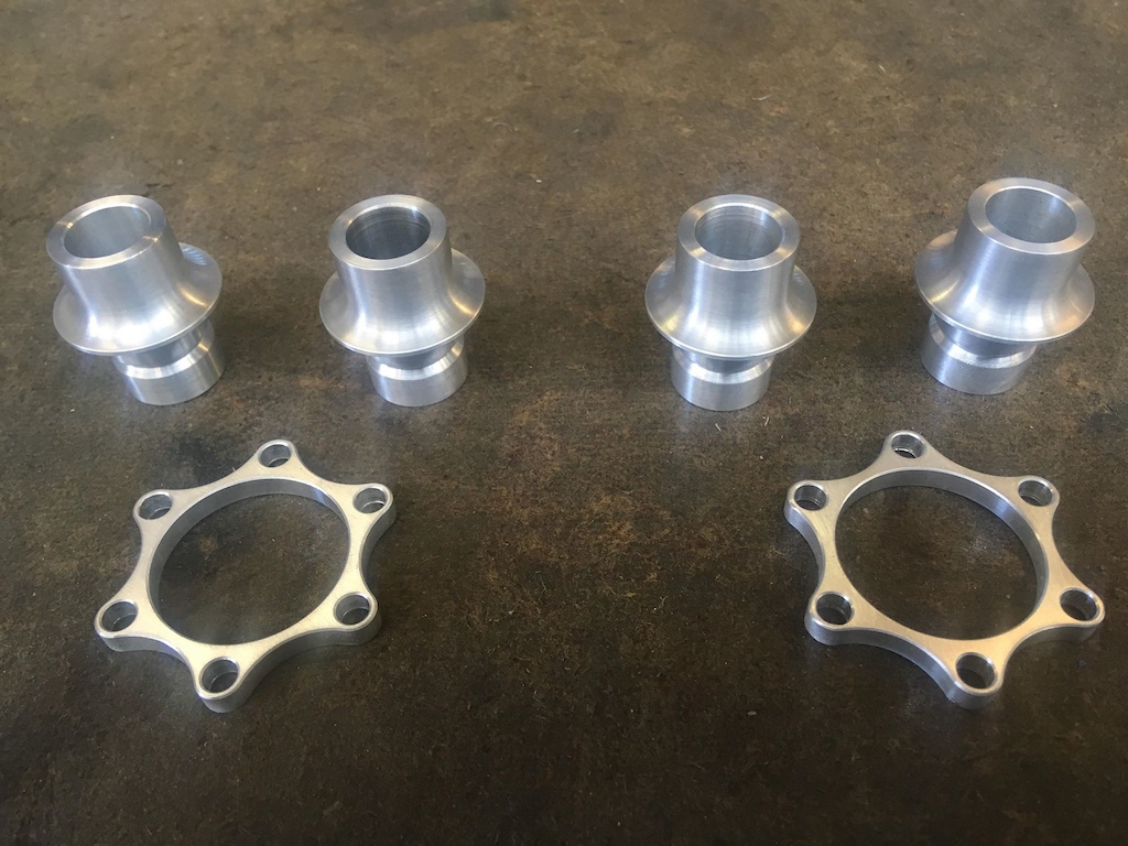 DIY Boost adaptors for Hope Pro 2 Evo front hubs, machined by a mate.