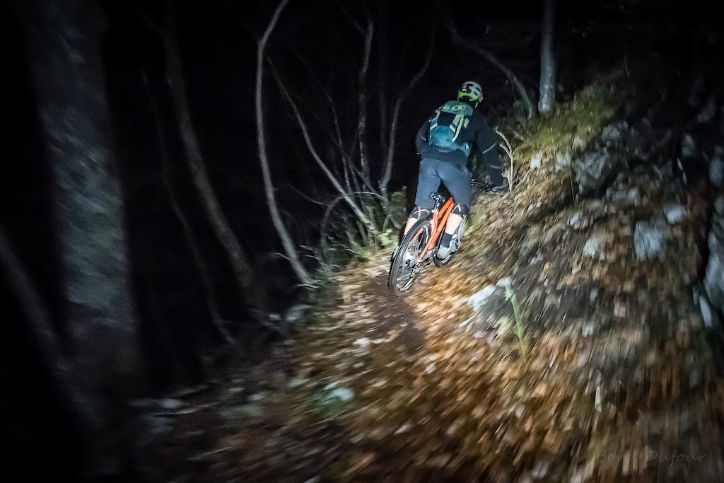 A friend with a hardtail and some headlamps...