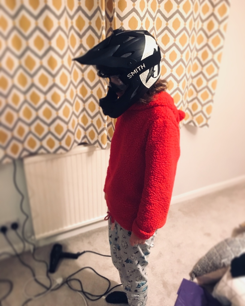 After spending all my cash on bike parts which pissed my girlfriend right off, I thought it would be a good idea to dress her up in my new riding gear. Repping the sixsixone full face with matching Smith goggles, some strange fluffy unwanted xmas present jumper and the rare as hell Moomin lowers, she absolutely loved it which can be seen here in our flat just before bedtime. Rad!