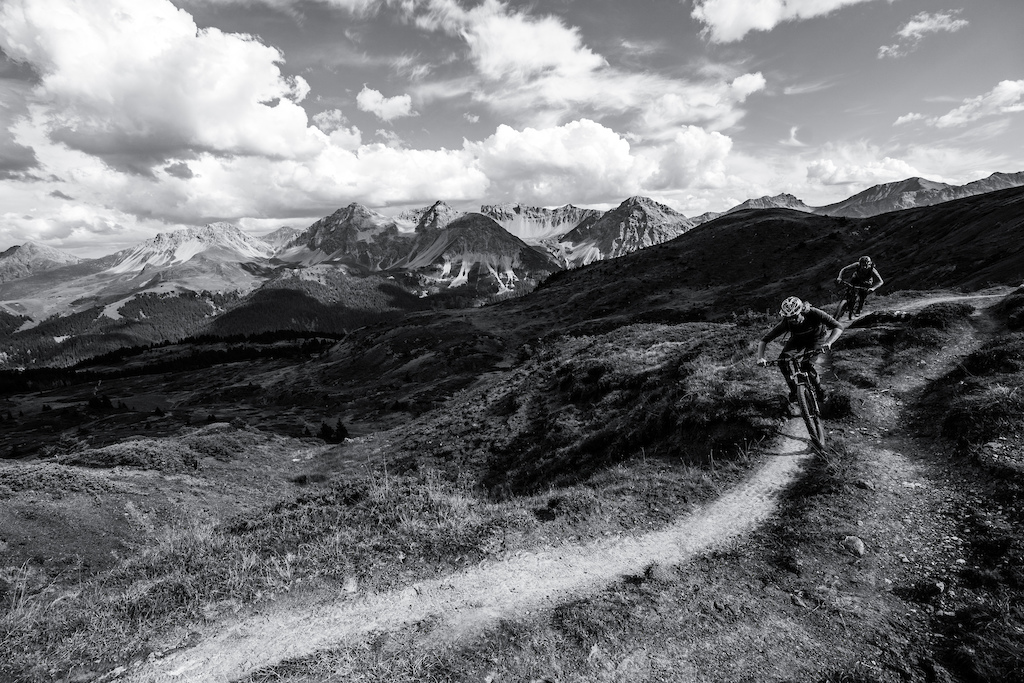Simon Johansson and Alexander BÃ¤ckvall riding in Arosa, Switzerland.