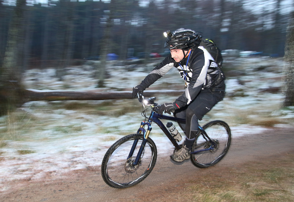 Strathpuffer 24 Hour Mountain Bike Race 19/20 January 2019. Held near Contin and Strathpeffer, Ross and Cromarty, Scotland. Both pictures taken on Sunday morning.