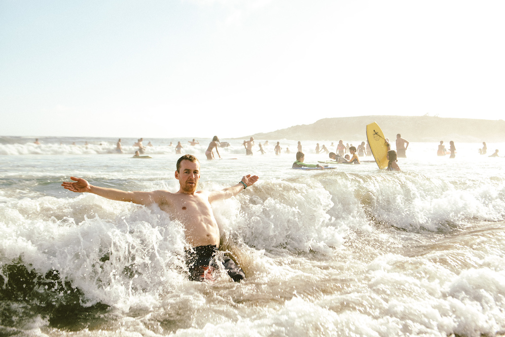 Jerome Clementz celebrates the completion of his third Andes Pacifico with a dip in the pacific.