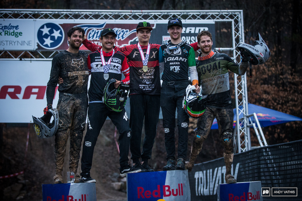 Pro Men's podium. Battered and soggy, but happy it's over.