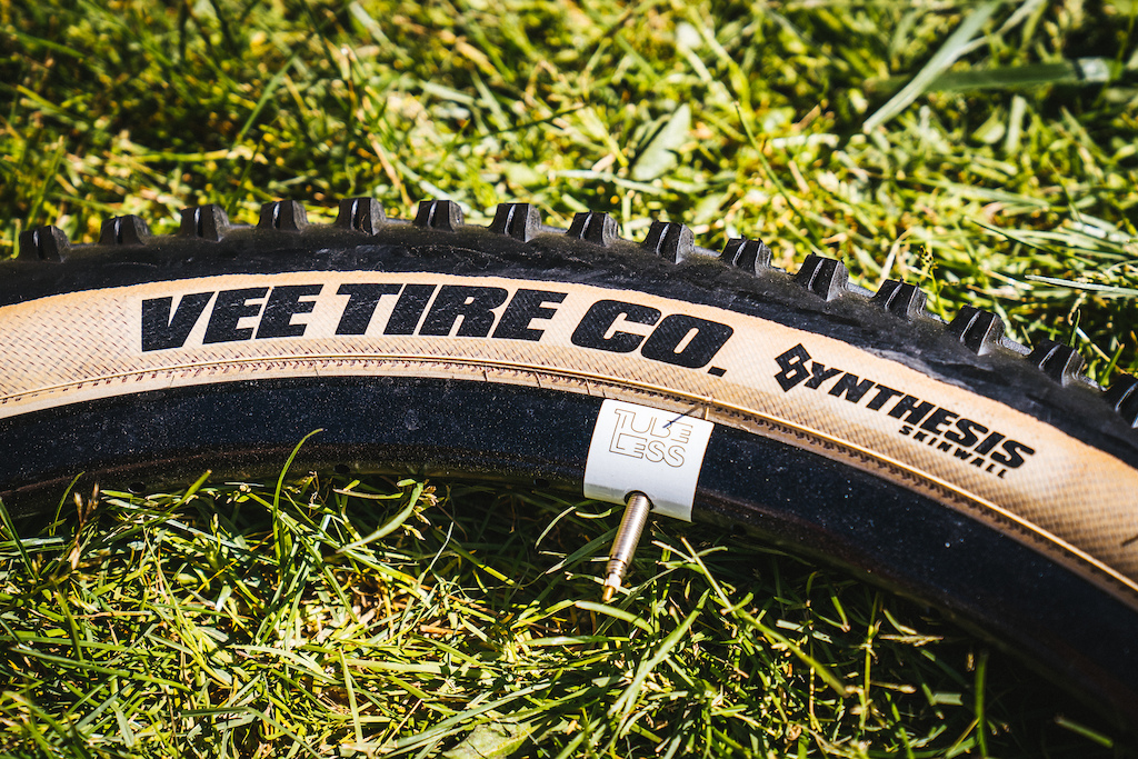 Vee Tire Co. Flow Snap: It took a while, but Vee Tire Co. evolved from an experiment into a tire maker worthy of note. The Flow Snap is their DH enduro tire and "Synthesis" is their skinwall option. The tread uses their softest Tackee rubber  and it is available in 2.35" casings (black or tan) and both 29 and 27.5" options. Weights range from 910 to 1270g.